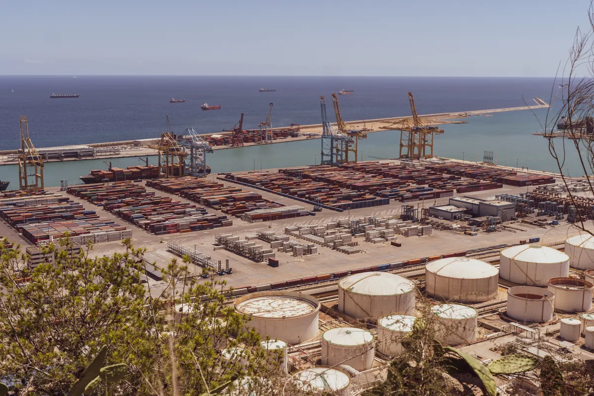 Industrial cargo port with container yard and cranes